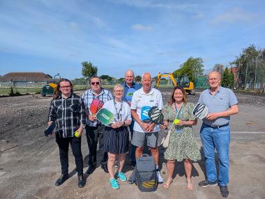 Cllrs and pickleball club members with work starting